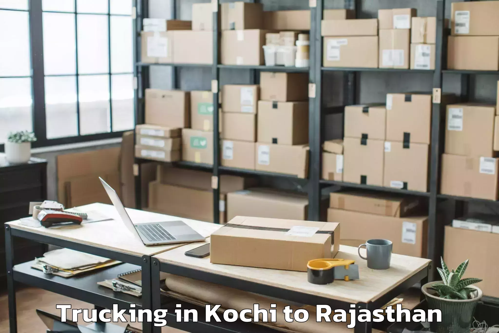 Book Kochi to Niit University Neemrana Trucking Online